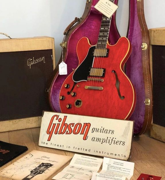 Gibson guitar with vintage catalogue and original guitar paperwork